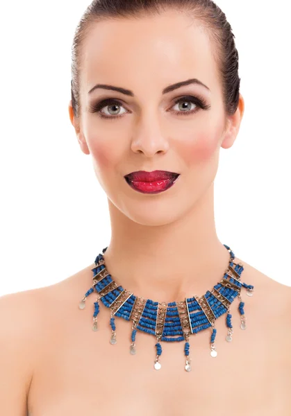 Beautiful woman wearing blue necklace Royalty Free Stock Images
