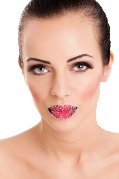 Woman's red lips coated with scattered sugar — Stock Photo, Image