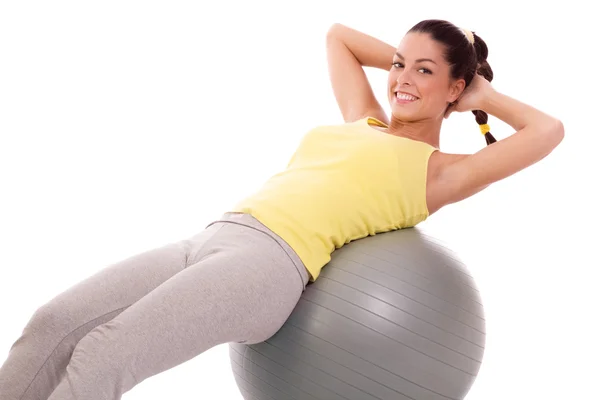 Woman exercising with exercise ball — Stock Photo, Image