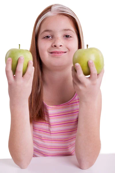 Roodharige meisje met groene appel — Stockfoto