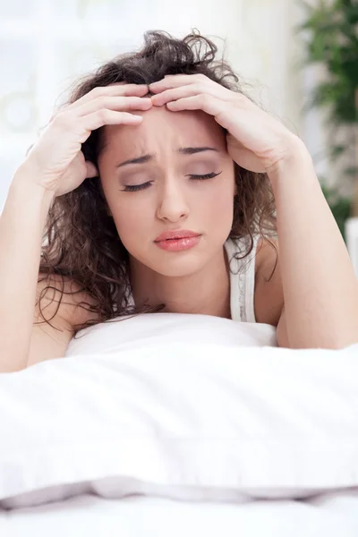 Beautiful woman having a headache — Stock Photo, Image