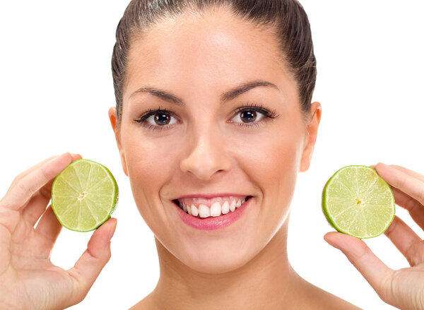 beautiful young woman with lemon 