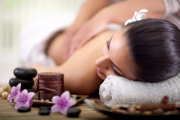 Beautiful woman having a wellness back massage — Stock Photo, Image