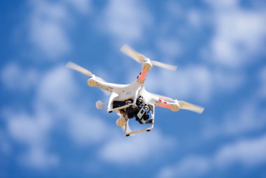Flying uav Quadrocopter drone  clipart