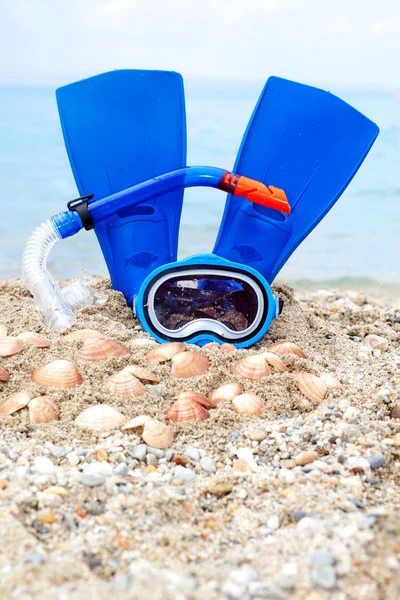 Mask, fins and tube in sand background — Stock Photo, Image