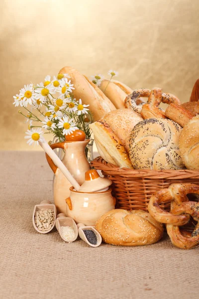 Various baked products in wicker basket — Stock Photo, Image