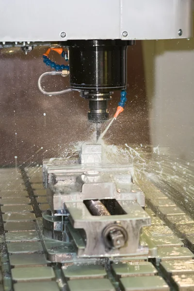 Milling machine working - cooling liquid — Stock Photo, Image