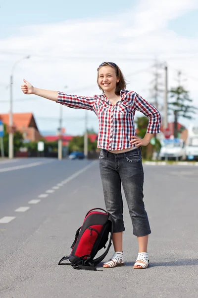 Ragazza adolescente autostop — Foto Stock