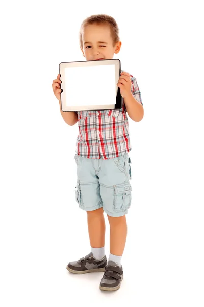 Niño pequeño mostrando PC tableta en blanco — Foto de Stock