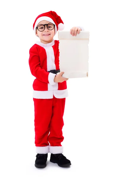 Piccolo Babbo Natale ragazzo mostra la lista dei desideri — Foto Stock