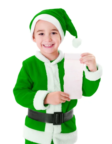 Pequeno menino Papai Noel verde mostrando lista de desejos — Fotografia de Stock