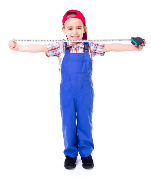 Little handyman with measuring tape — Stock Photo, Image