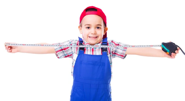 Kleiner Handwerker mit Maßband — Stockfoto