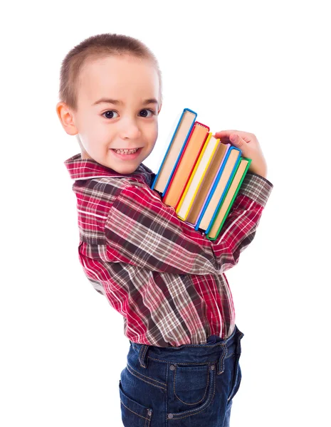 Kleine jongen uitvoering boeken — Stockfoto