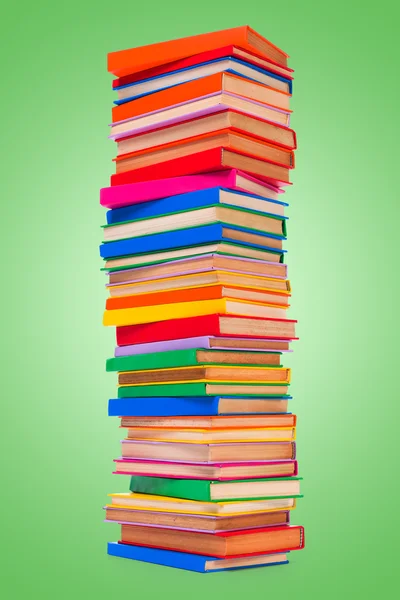 Kleurrijke gestapelde boeken — Stockfoto
