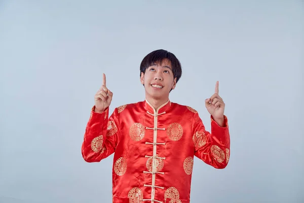 Happy Asian Man Traditional Oriental Costume Pointing Fingers Copy Space — Stock Photo, Image
