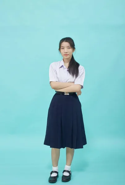 Fiatal Ázsiai Diák Lány Középiskola Diák Egyenruha Világoskék Stúdió Elszigetelt — Stock Fotó