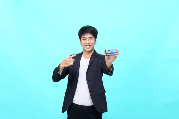 Portrait Young Asian Businessman Holding Showing Credit Card Hand Isolated — 스톡 사진