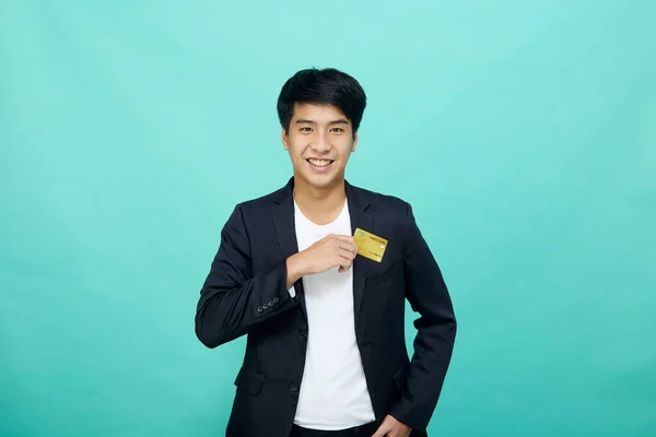 Portrait Young Handsome Businessman Suit Holding Yellow Credit Card Isolated — стоковое фото