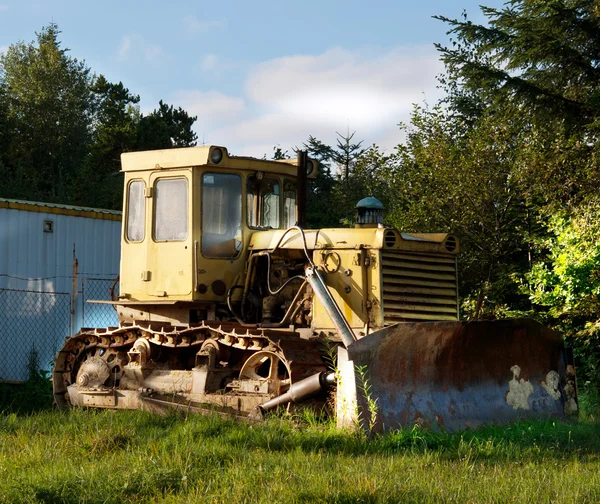 Old dirty yellow bulldozer — Stock Photo, Image