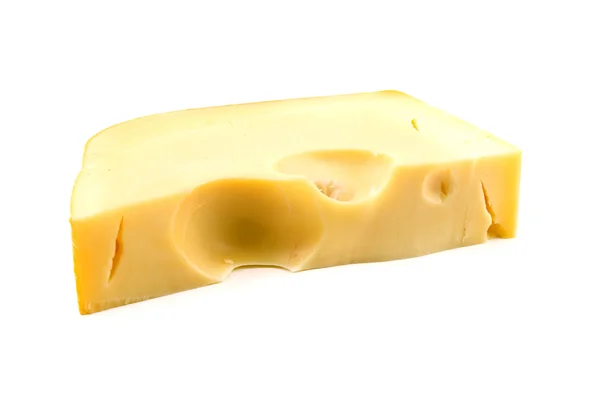 Kawałek sera jest na białym tle — Zdjęcie stockowe