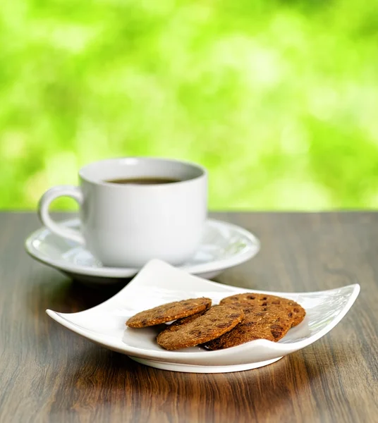 Galletas de café y avena sobre fondo natural — Foto de Stock