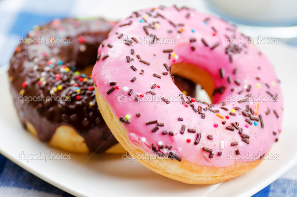 Fresh donuts on nature background