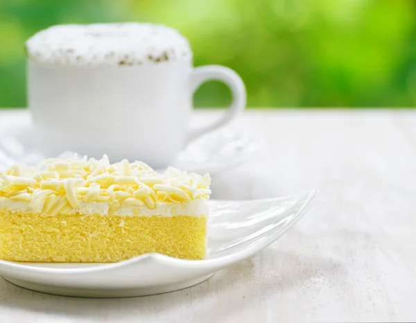 Kopje koffie met vers gebak — Stockfoto