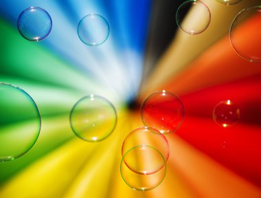 Soap bubbles and multi-coloured background