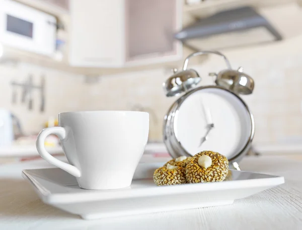 Cup of coffee in a kitchen — Stock Photo, Image