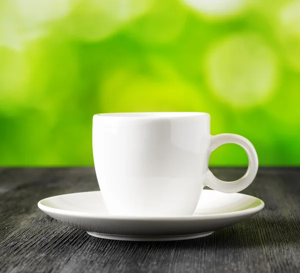 Cup of coffee on nature background — Stock Photo, Image