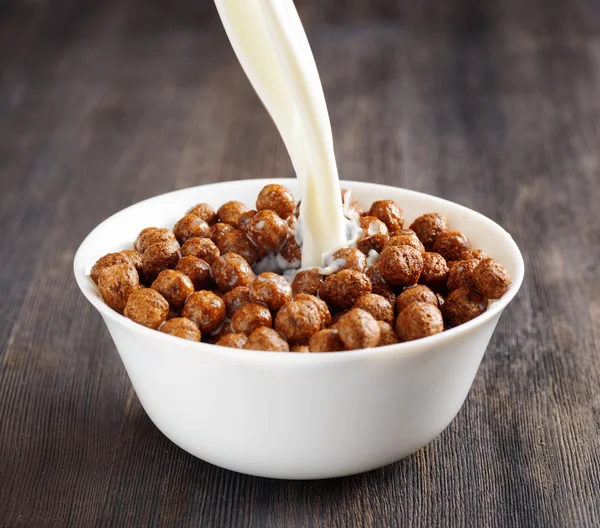 Bowl of chocolate cereal on a table — Stock Photo, Image
