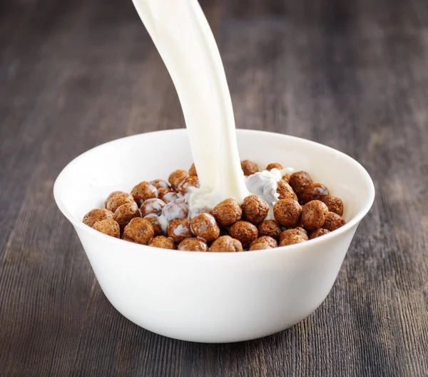 Bowl of chocolate cereal on a table — Stock Photo, Image
