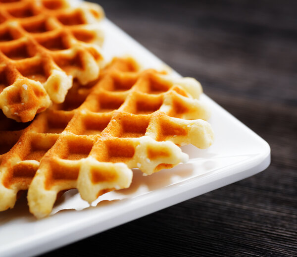 Waffles on a white square plate