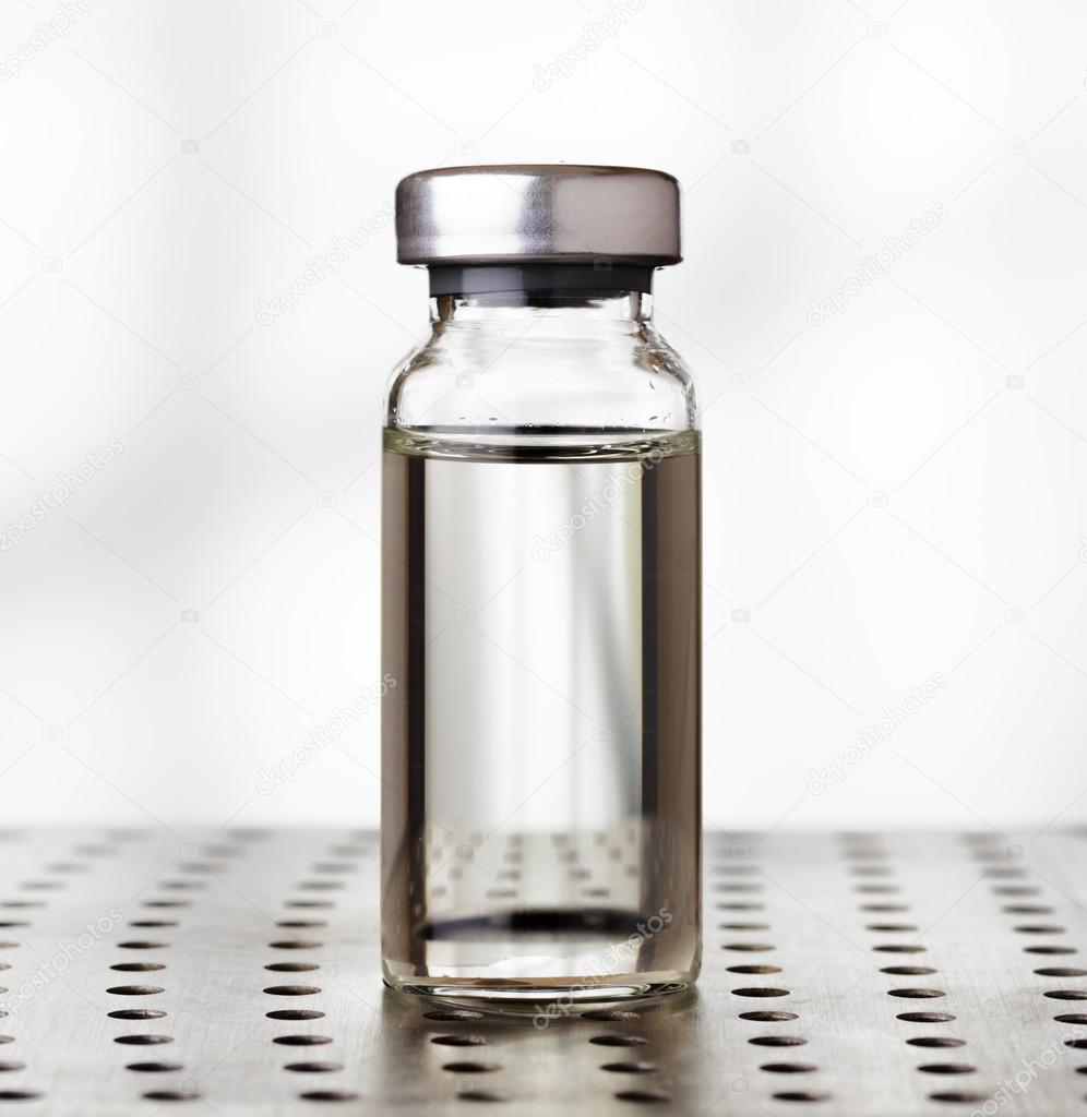 Medical vial of liquid in laboratory