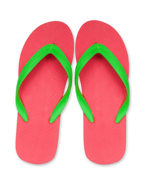 Červené ang zelené pantofle sandále, samostatný — Stock fotografie