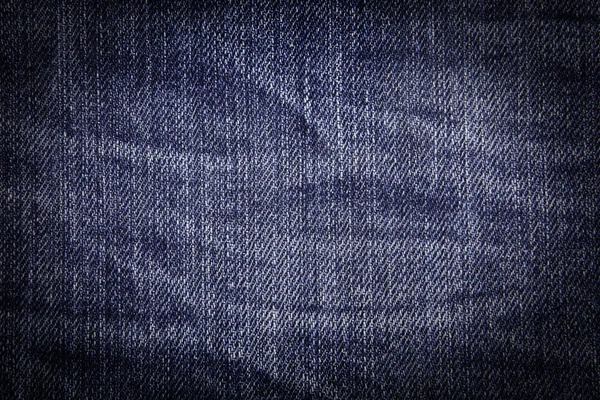 Arrugado viejo azul jean fondo —  Fotos de Stock