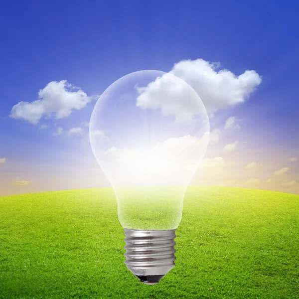 Sunrise inside light bulb — Stock Photo, Image