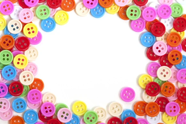 Multi color buttons on white background with copy space — Stock Photo, Image