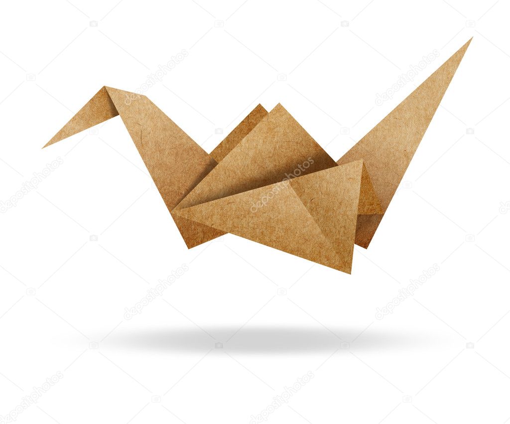 Origami Bird from Brown paper cardboard on white background 