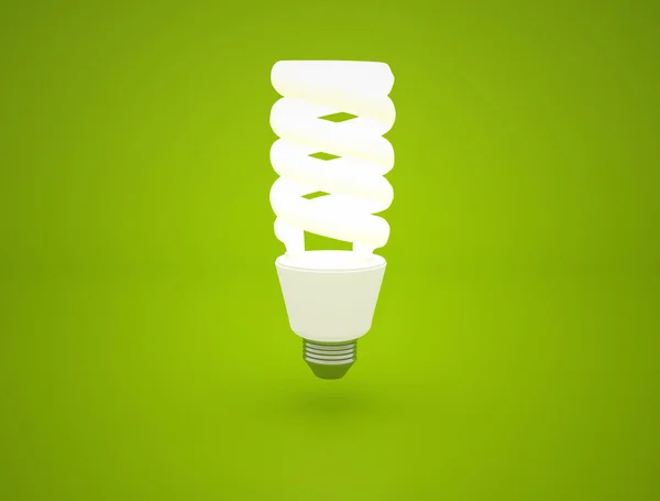 Λαμπερό ιδέα λάμπα φωτός στον πράσινο φόντο — Φωτογραφία Αρχείου