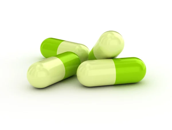 Green pills - medical background — Stock Photo, Image