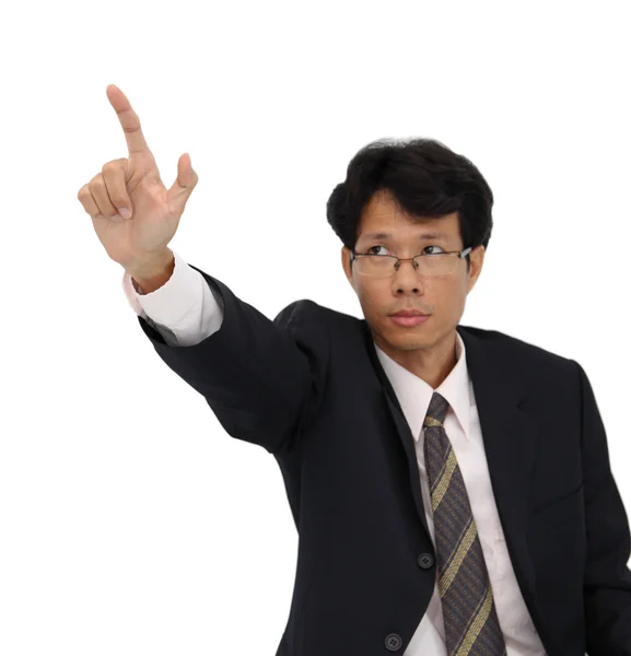 Ο άνθρωπος των επιχειρήσεων επισημαίνοντας την εστίαση στο δάχτυλο σε άσπρο φόντο. — Φωτογραφία Αρχείου