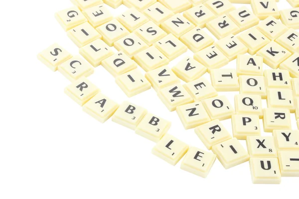 Scrabble bloco peça no fundo branco . — Fotografia de Stock