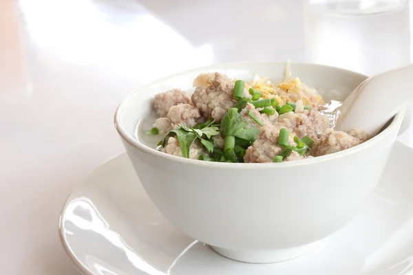 Pork congee and fried garlic on morning table. — Stock Photo, Image