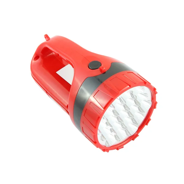 Red plastic pocket flashlight on white background. — Stock Photo, Image