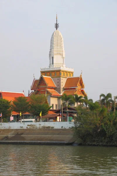 White pagoda on church roof near river. — Stock Photo, Image