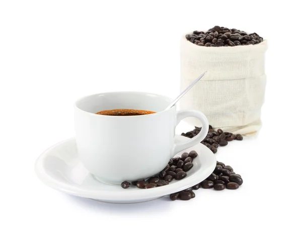 Cup of coffee and bag beans focus on front cup. — Stock Photo, Image