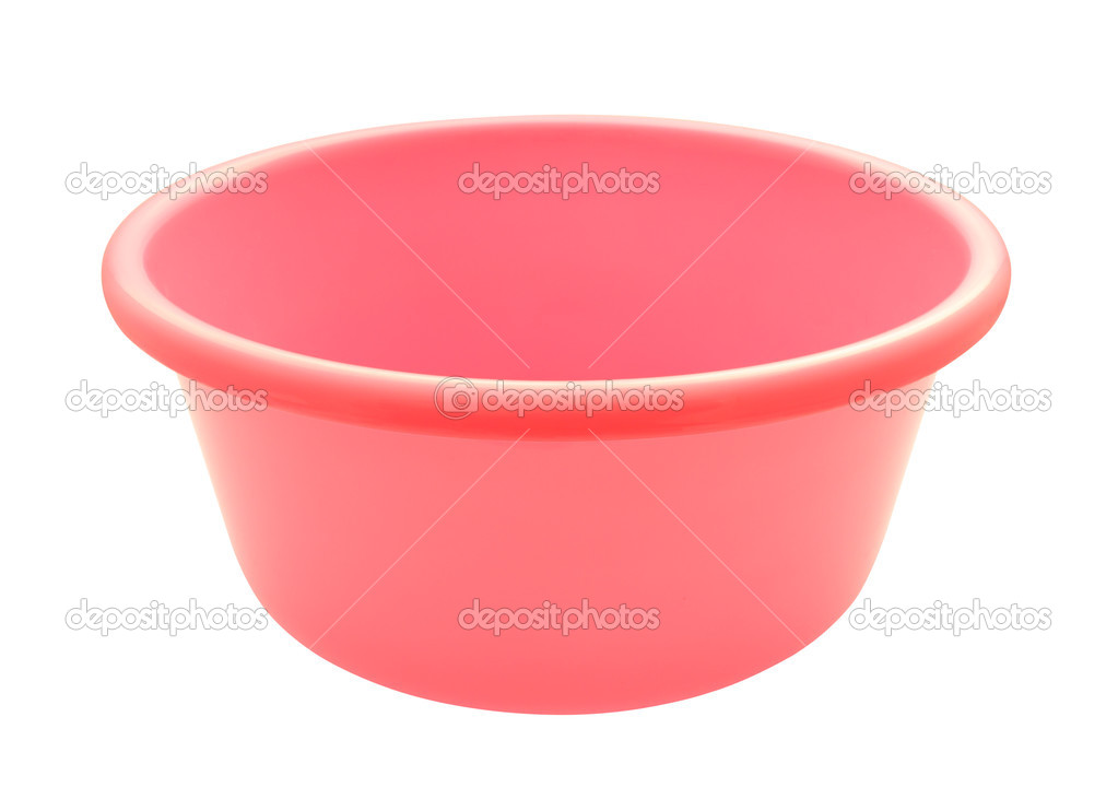 Pink plastic round bowl on white background.