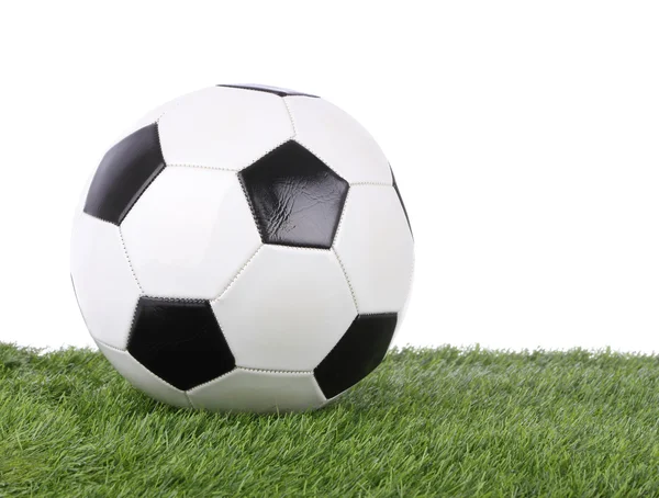 Stitch leather soccer ball on green grass field. — Stock Photo, Image